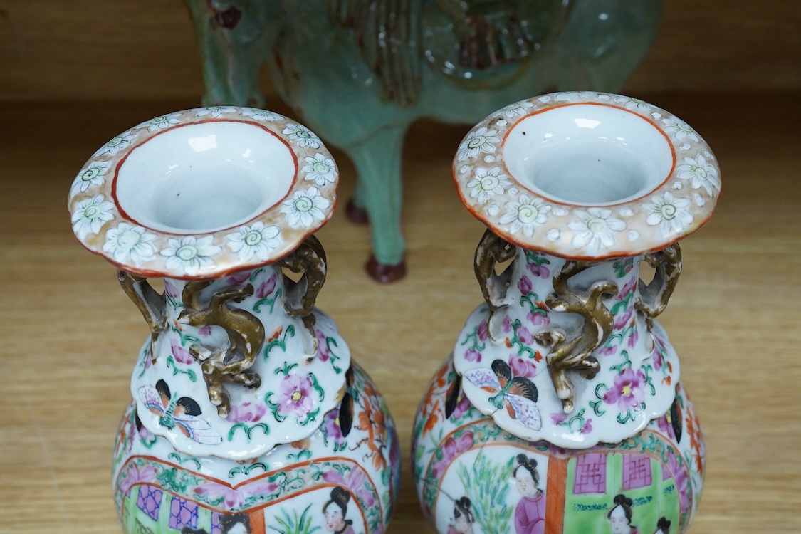A pair of Chinese famille rose vases, two Canton plates and a green glazed horse, largest 29cm wide